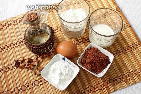 Для приготовления нам понадобятся молоко, какао порошок, крахмал, яйцо, масло растительное, сахар, мука пшеничная и разрыхлитель.